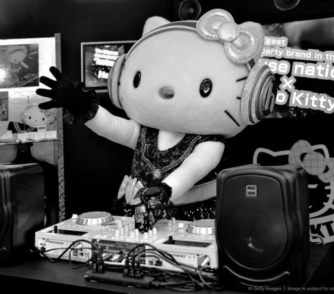 a person in Hello Kitty Body suit DJing