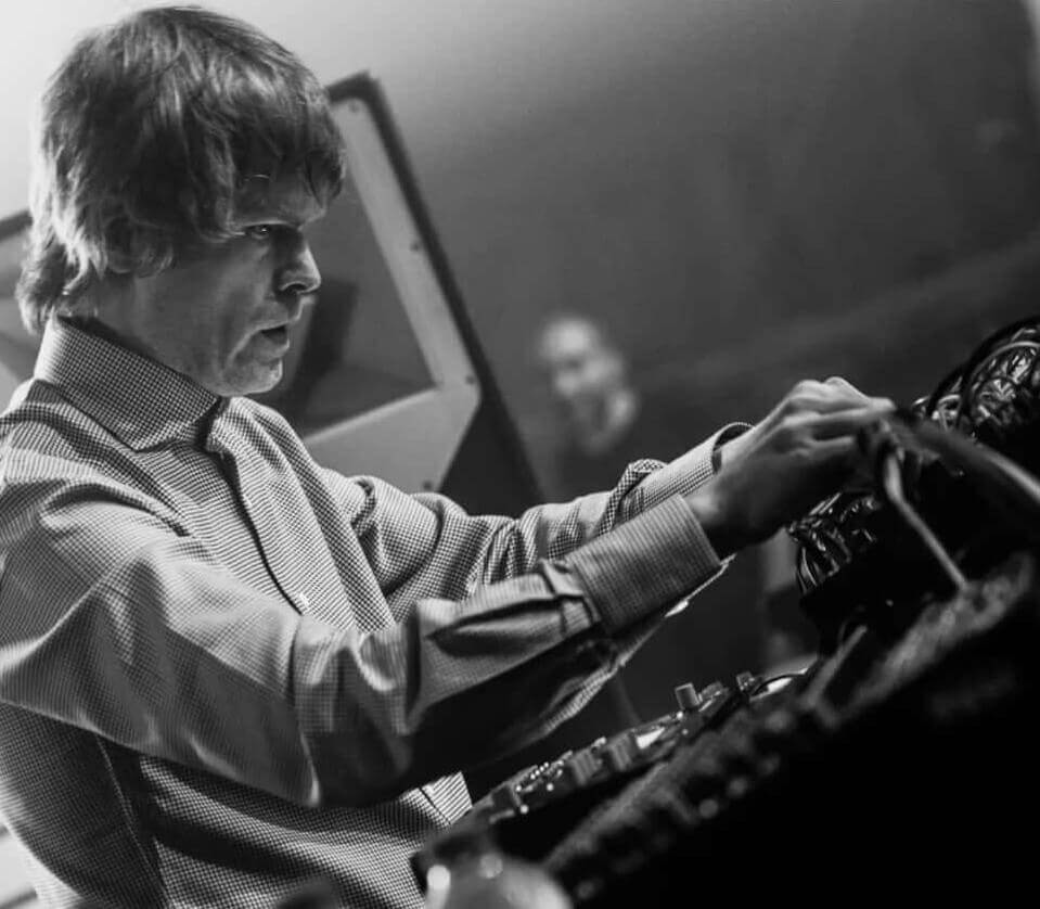 a man on stage DJing